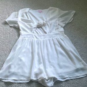 Pink Lily white romper. Worn 1 time. Size small.